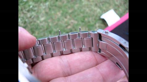 omega speedmaster remove links.